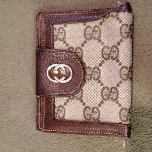 Genuine Gucci mini wallet. Very well used. Could use repair. Bought in Italy '86